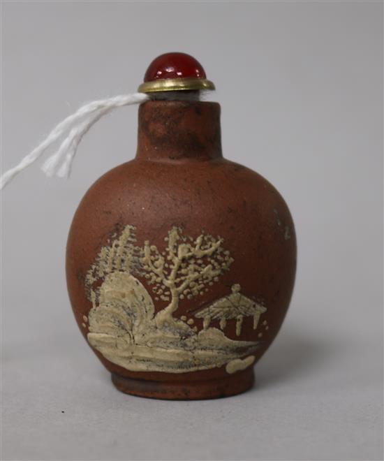 A Chinese Yixing pottery snuff bottle, manner of the Master of the Rocks 5cm.